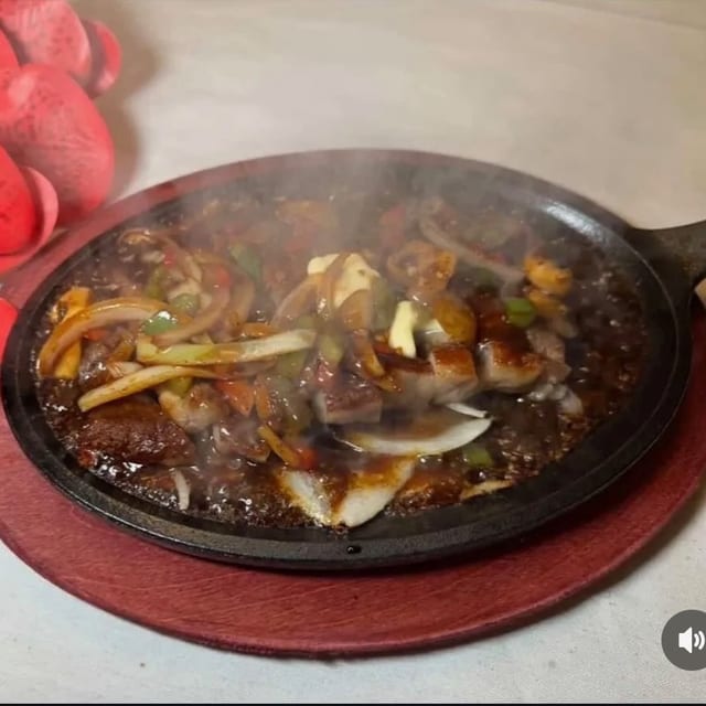 Sizzling Black Pepper Steak.